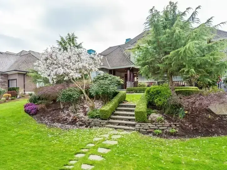 Retaining wall and hardscape design for a sloped yard near Marymoor Park in Redmond