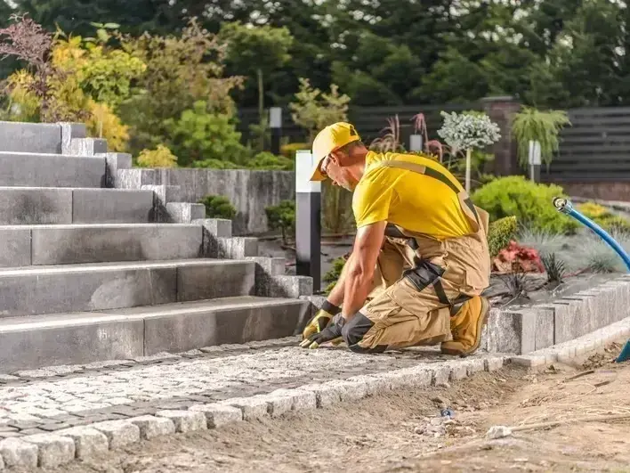 Custom backyard water feature and paver layout for Panther Lake home in Kent WA